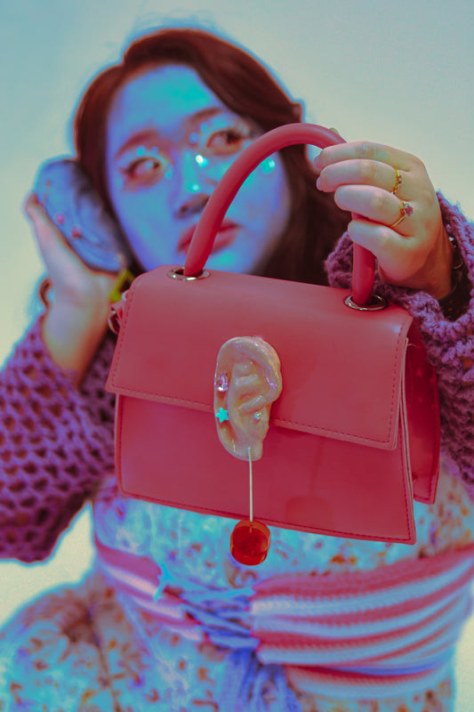 “Near sighted” hand bag