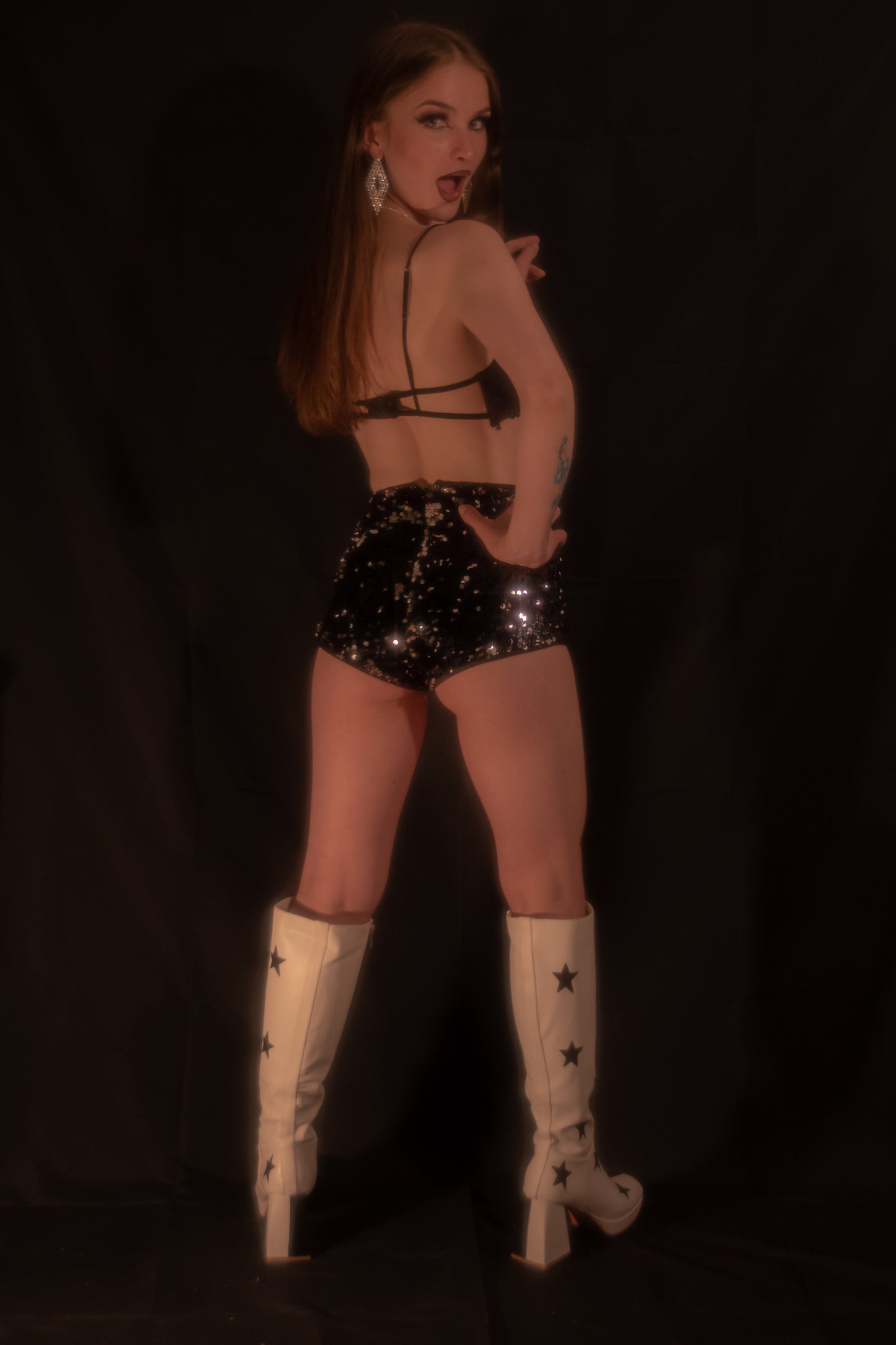 “Black Madonna” go go boots