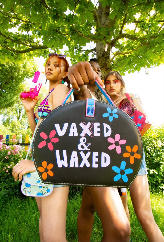 “Vaxxed & Waxed” makeup case/handbag